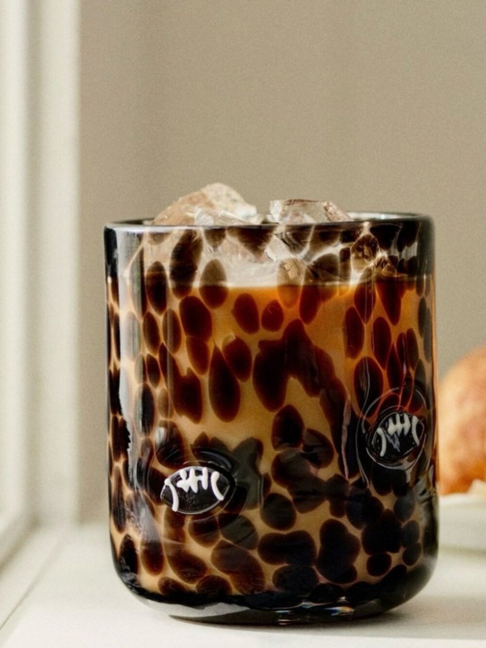 Anthropologie icon juice glass Football Black
